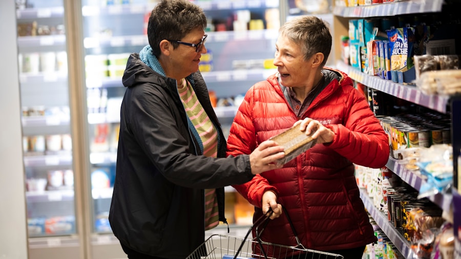 customer comparing grocery prices checkout