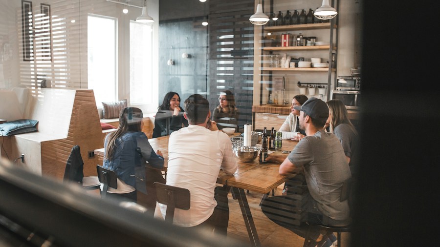 employees in office meeting discussion