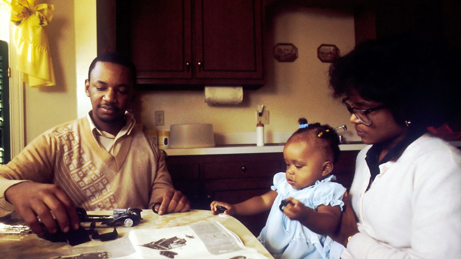 family reviewing household bills