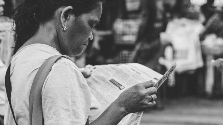 frustrated shopper checking grocery receipt