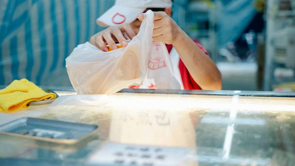 frustrated shopper checking receipt at store