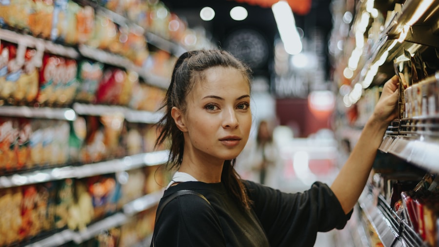grocery store employee shelf stocking