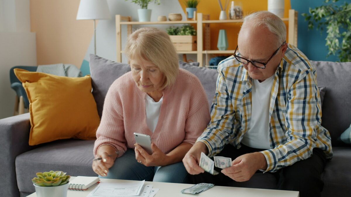 older couple reviewing financial documents