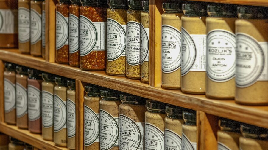 retail employee using digital shelf labels