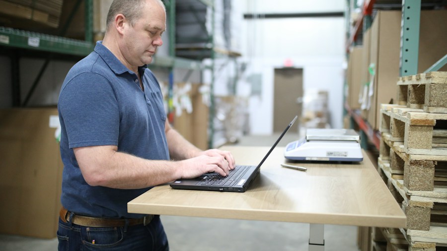 retail worker checking inventory