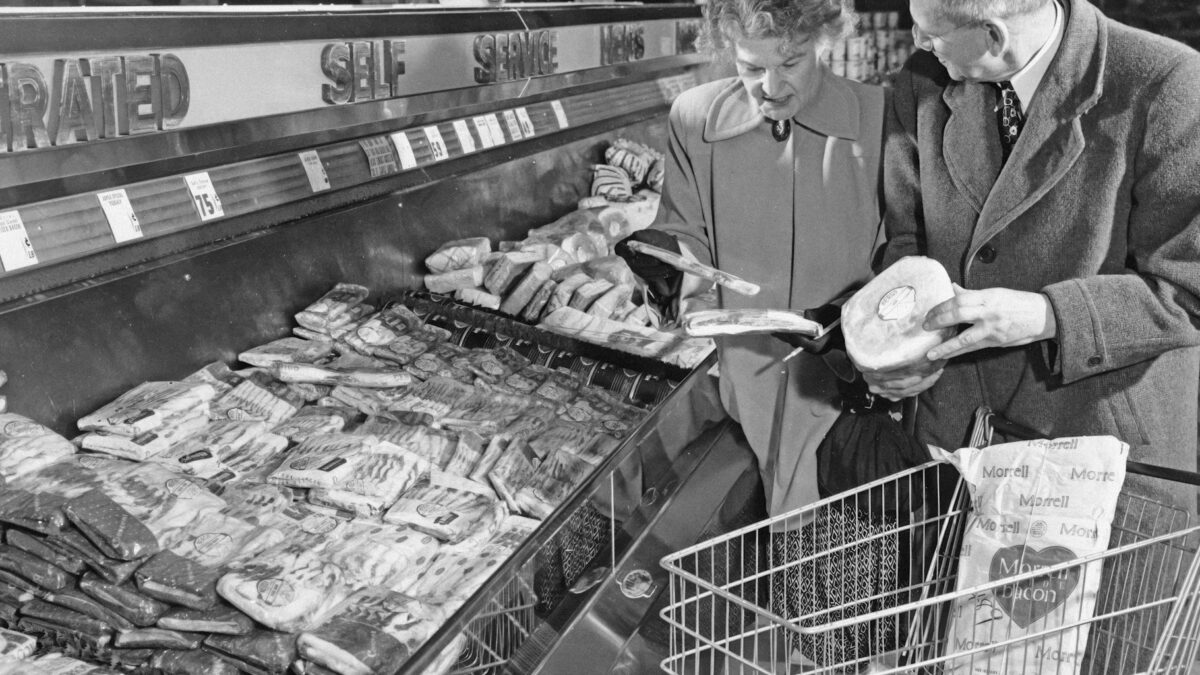 shopper at grocery store with receipt