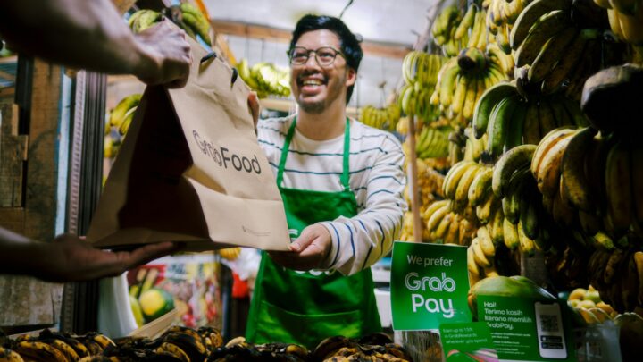 shopper checking grocery receipt inflation