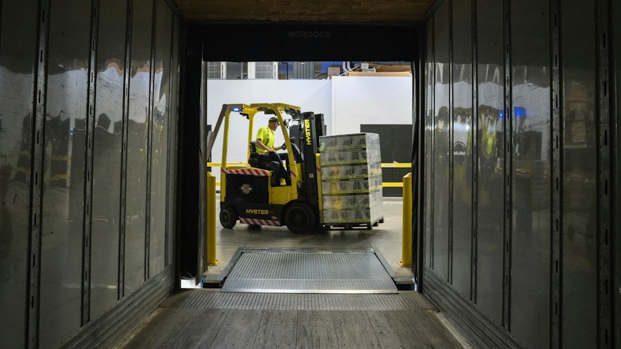 warehouse staff loading delivery vehicles