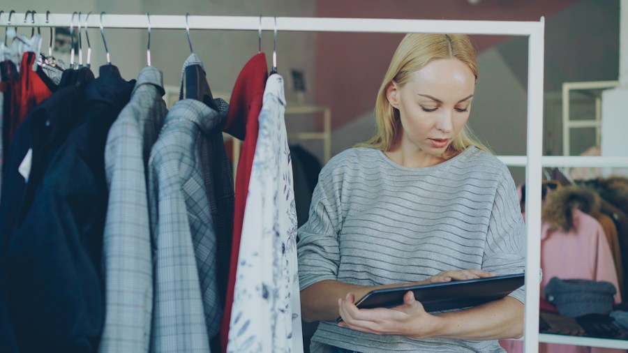 woman comparing product prices