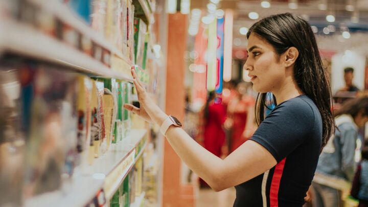 worried shopper checking prices